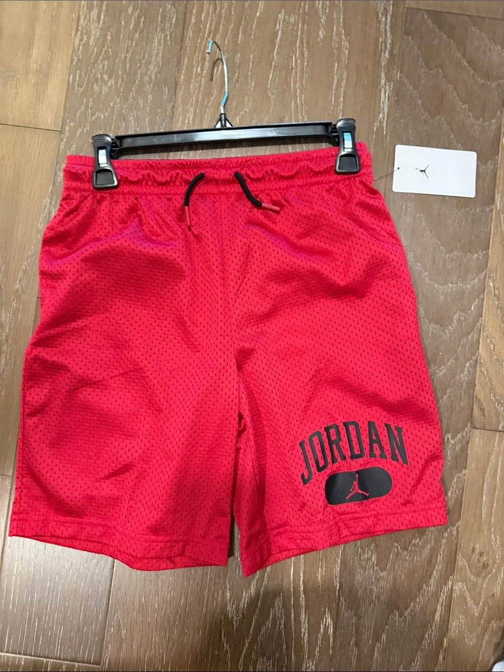 Jordan Red Mesh Athletic Shorts with Black Logo